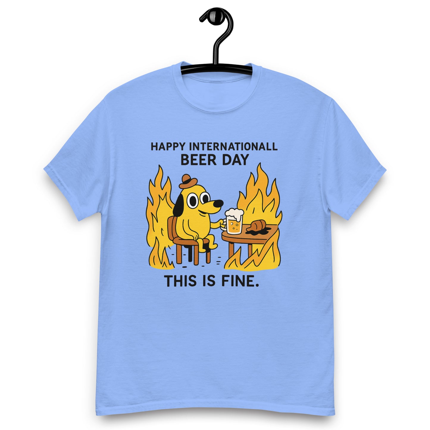 Graphic t-shirt with beer mugs clinking and International Beer Day text, flat lay