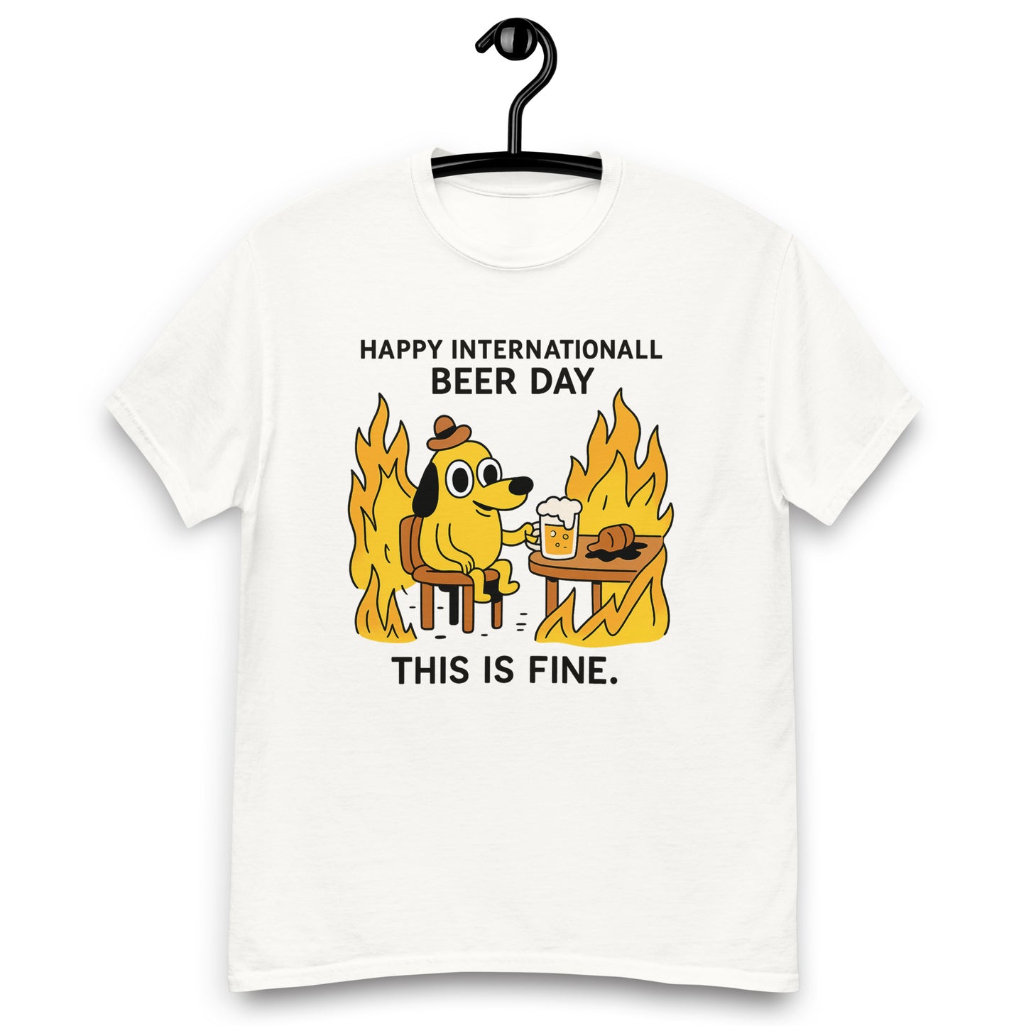 Graphic t-shirt with beer mugs clinking and International Beer Day text, flat lay