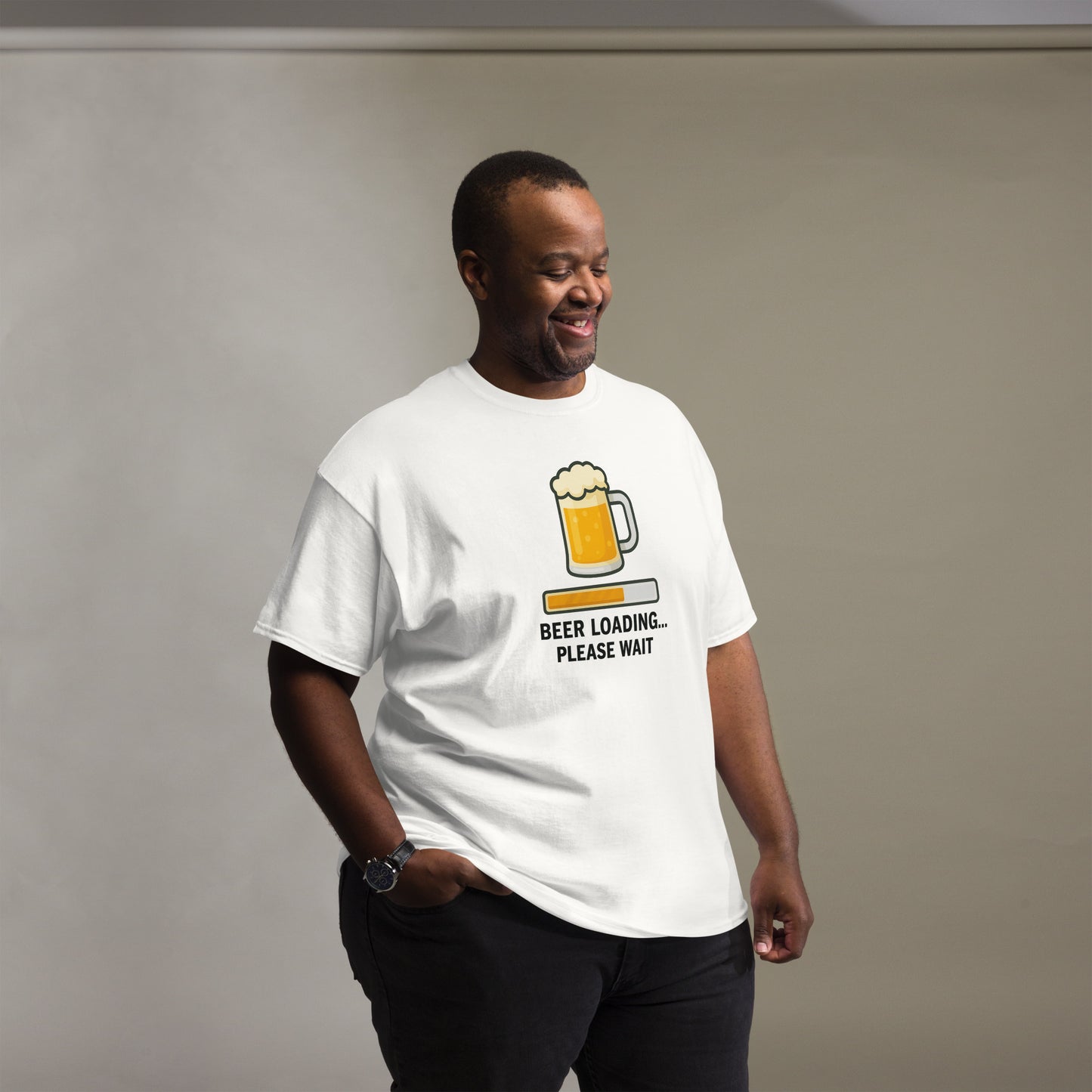 Graphic t-shirt with beer mugs clinking and International Beer Day text, flat lay