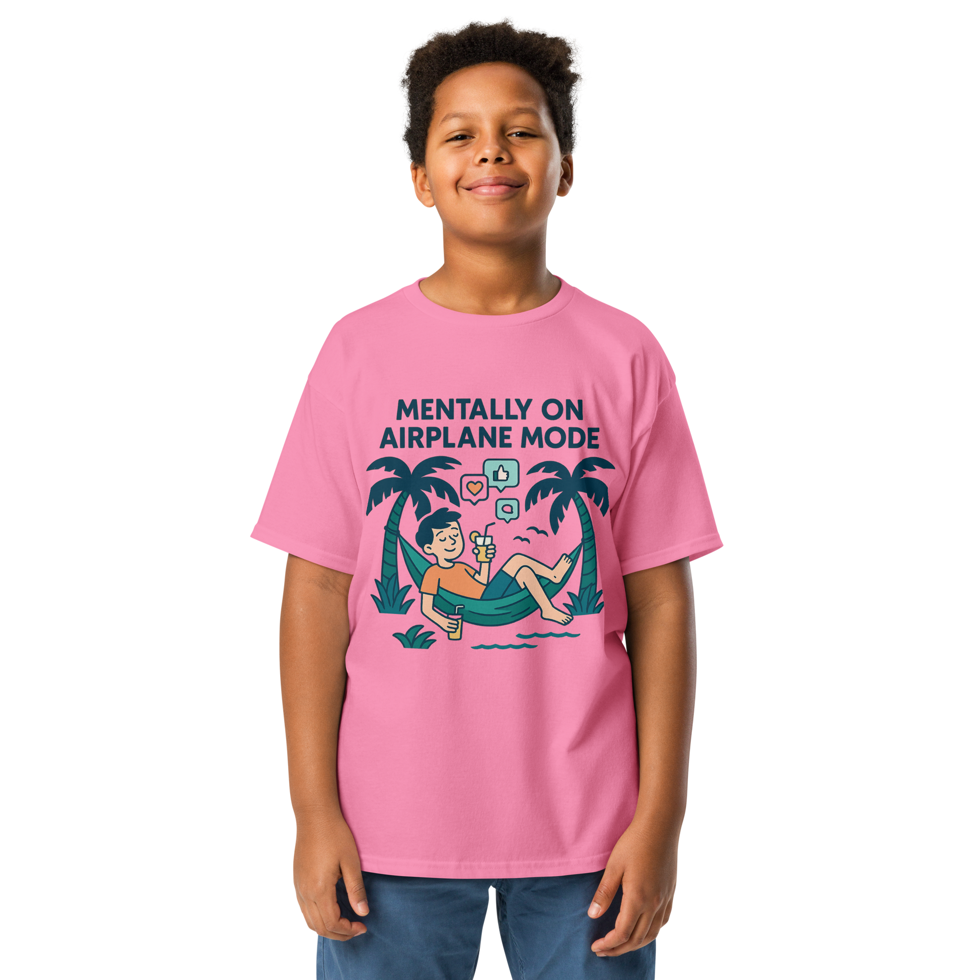 School’s Out t-shirt with bold colorful lettering, flat lay on wooden surface