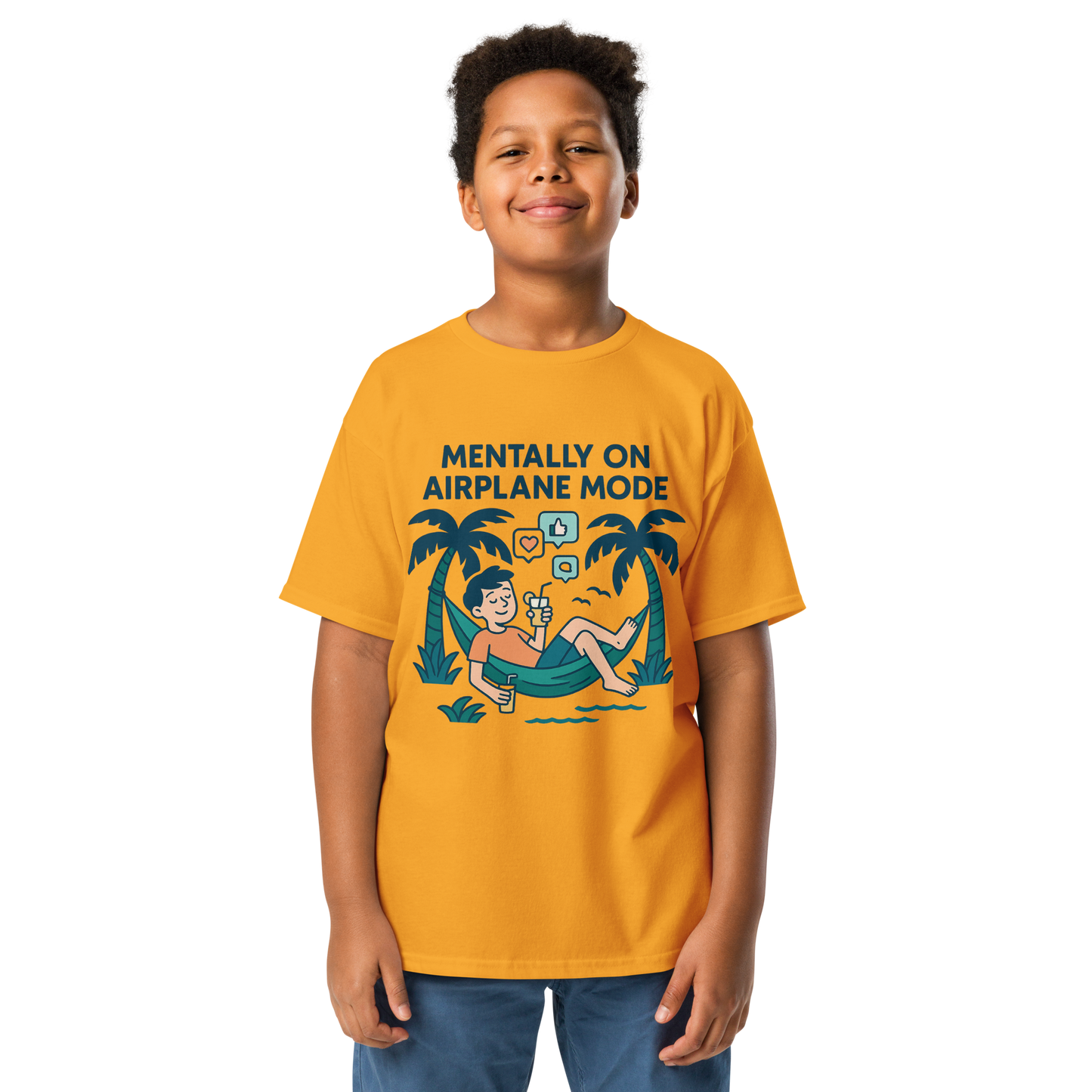 School’s Out t-shirt with bold colorful lettering, flat lay on wooden surface