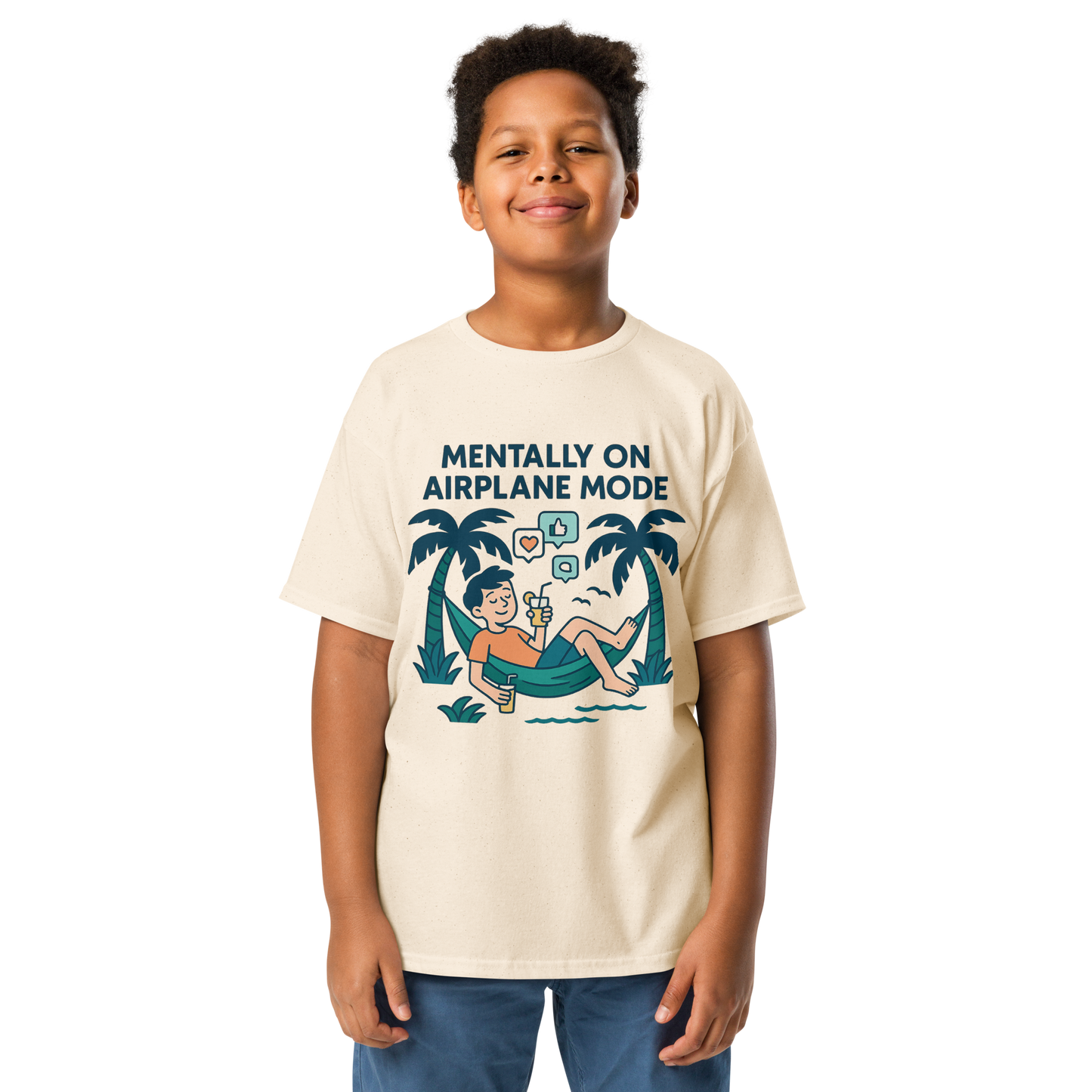 School’s Out t-shirt with bold colorful lettering, flat lay on wooden surface