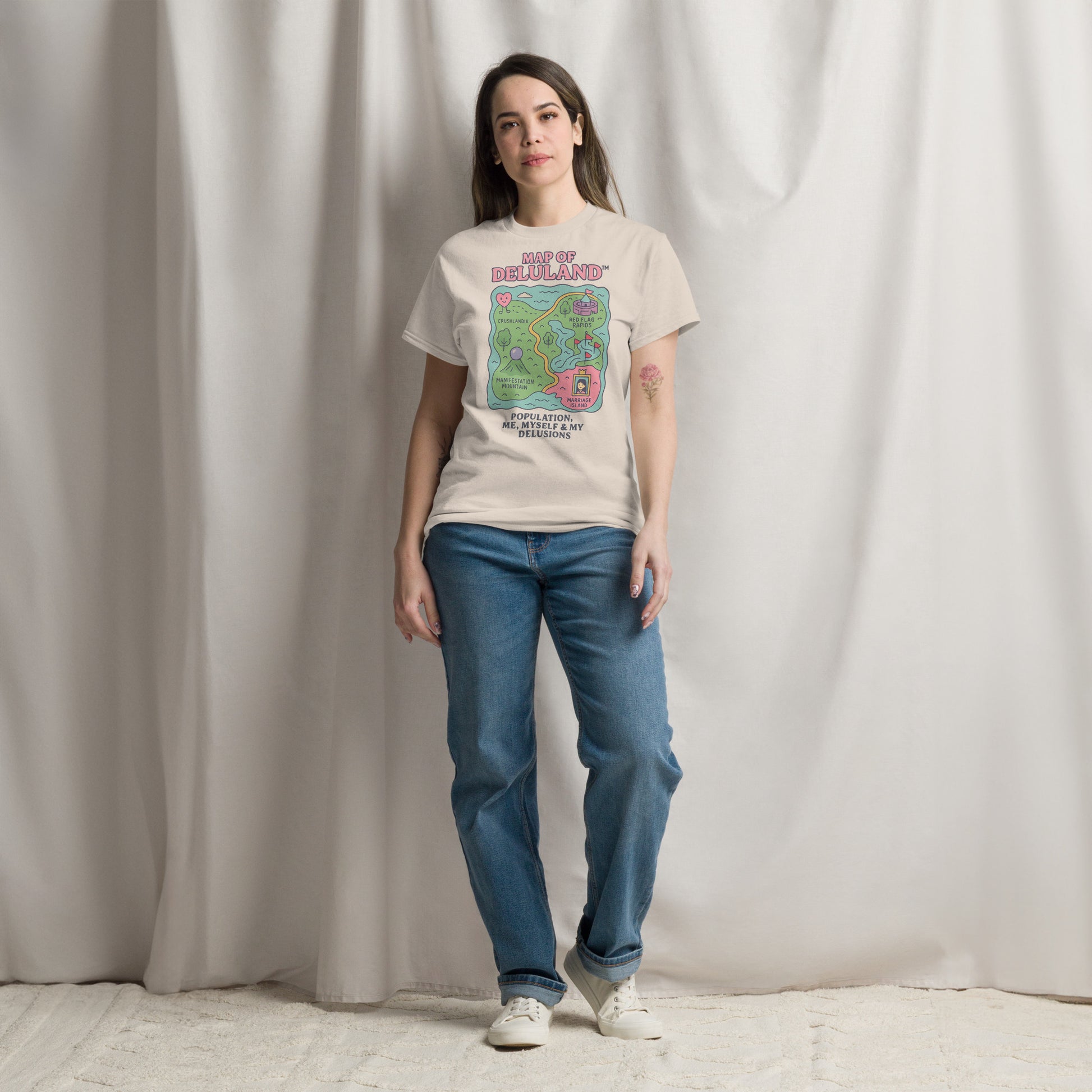 Model wearing Delulu is the Solulu shirt with dreamy background